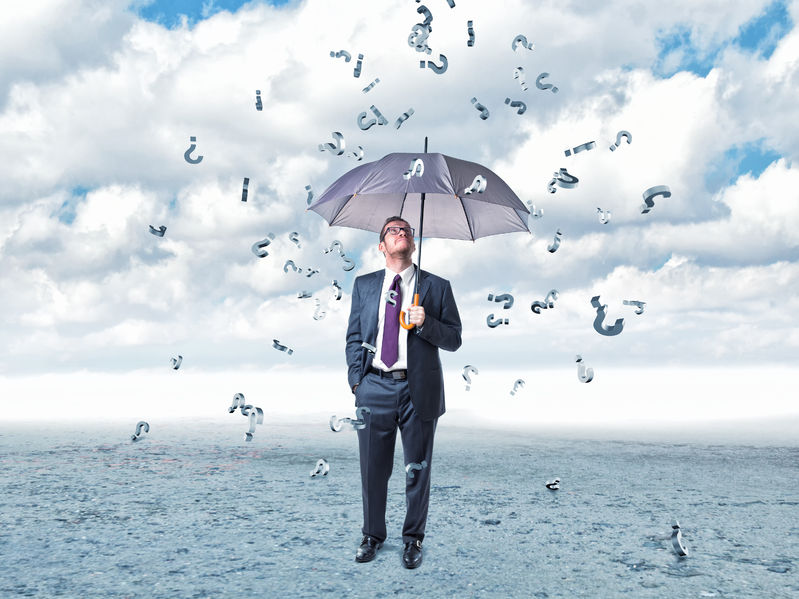 27342435 – businessman with umbrella and question mark rain